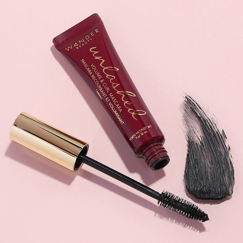 Wander Beauty Unlashed Volume and Curl Mascara with wand and red tube
